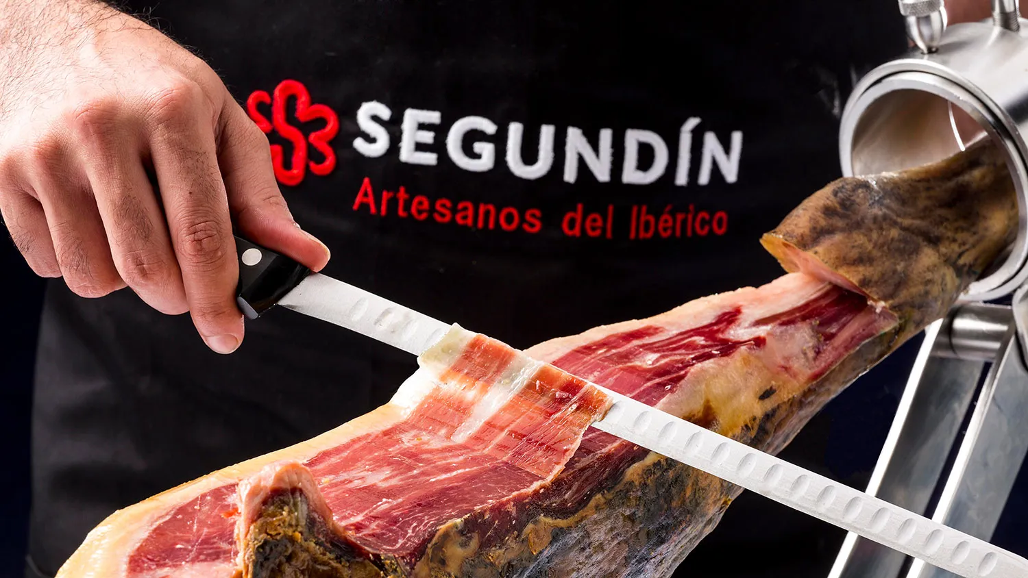 SEGUNDÍN – Artesano cortando jamón ibérico Artesanos del Ibérico